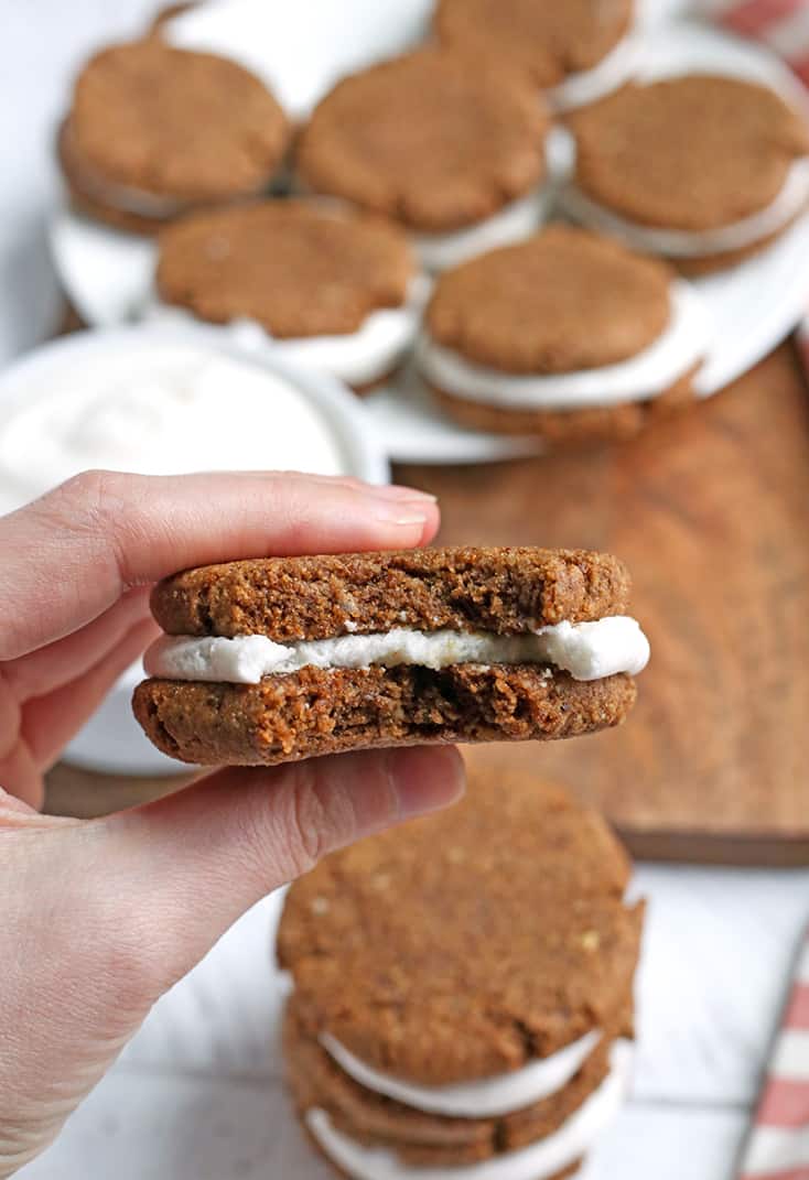 These Paleo Oatmeal Cream Pies contain no oatmeal, but still have the same taste and texture. A soft, sweet cookie with a marshmallow filling. Gluten free, dairy free, and naturally sweetened.