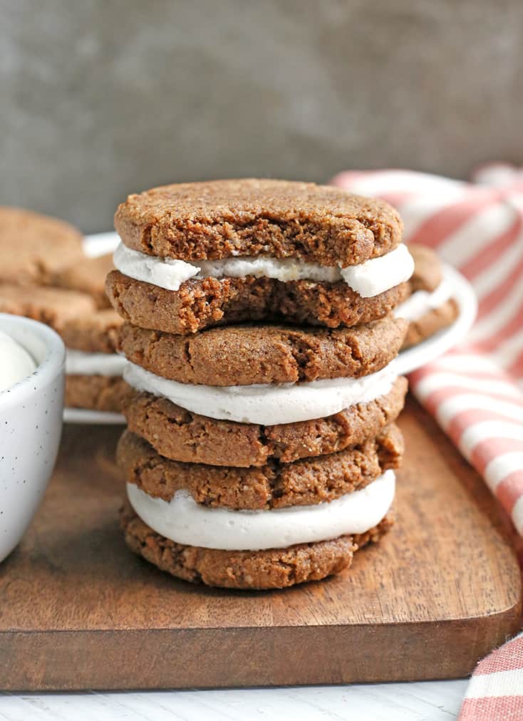 These Paleo Oatmeal Cream Pies contain no oatmeal, but still have the same taste and texture. A soft, sweet cookie with a marshmallow filling. Gluten free, dairy free, and naturally sweetened.