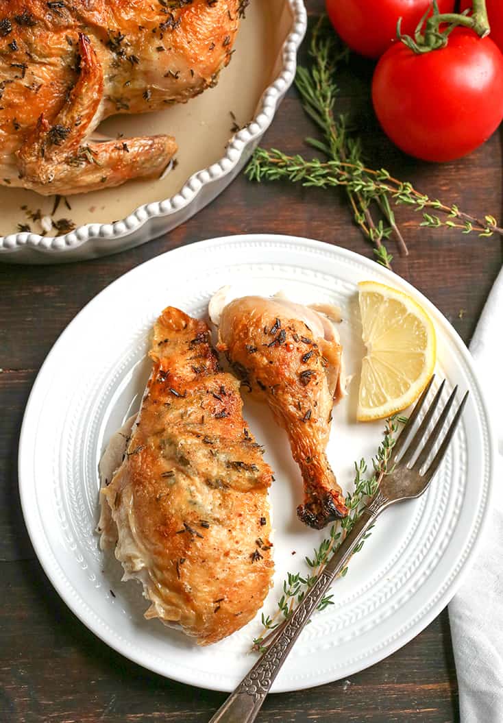 This Paleo Whole30 Air Fryer Whole Roasted Chicken is easy and incredibly delicious! Fresh herbs add great flavor and it has the best crispy skin. It's gluten free, dairy free, low carb and low FODMAP.