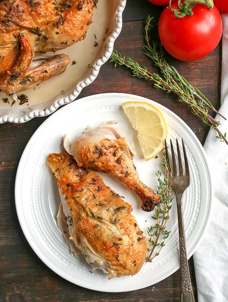 This Paleo Whole30 Air Fryer Whole Roasted Chicken is easy and incredibly delicious! Fresh herbs add great flavor and it has the best crispy skin. It's gluten free, dairy free, low carb and low FODMAP.