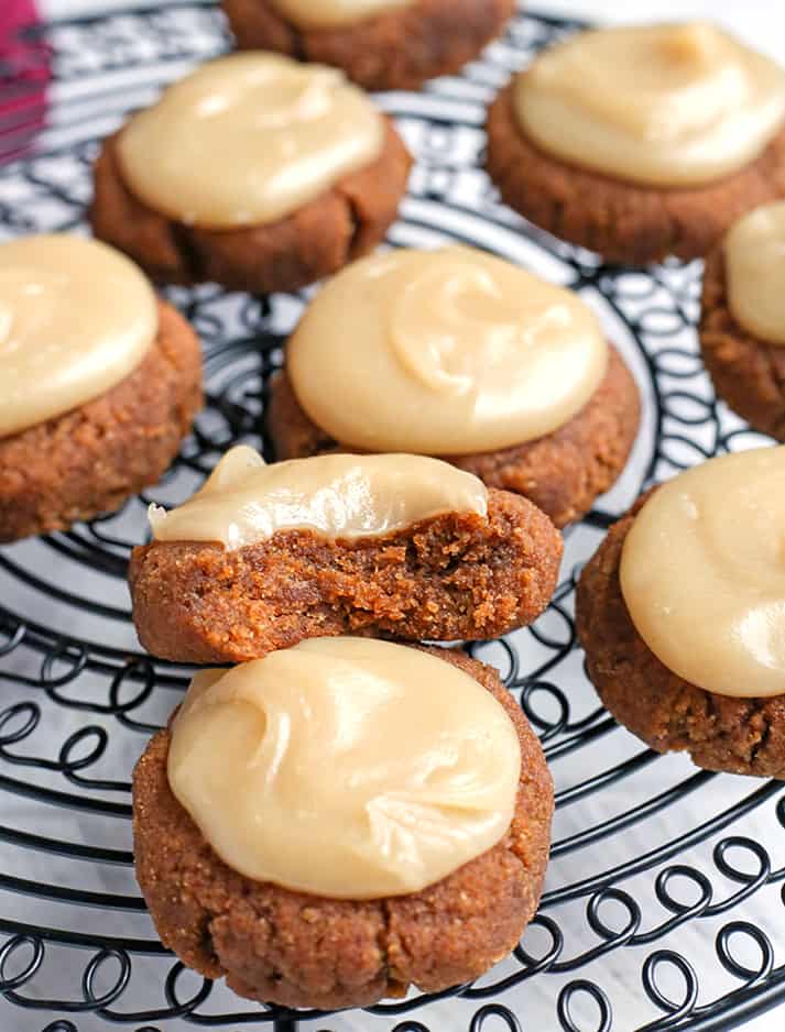 These Paleo Soft Pumpkin Cookies are easy to make and incredibly delicious! A thick pumpkin cookie, spiced just right and topped with a sweet frosting. They are gluten free, dairy free, and naturally sweetened.