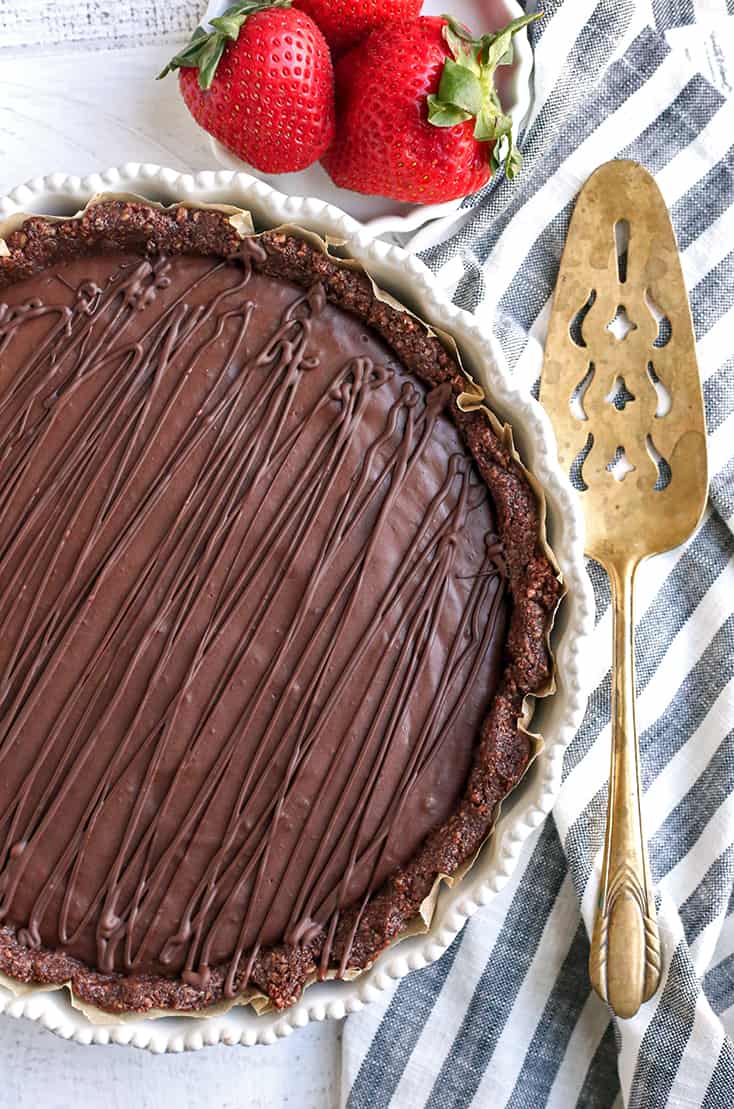 This Paleo Vegan Double Chocolate Pie is rich, easy, and so delicious! No-bake and a chocolate lovers dream. It's gluten free, dairy free, egg free, nut free, and naturally sweetened, but everyone will love it!