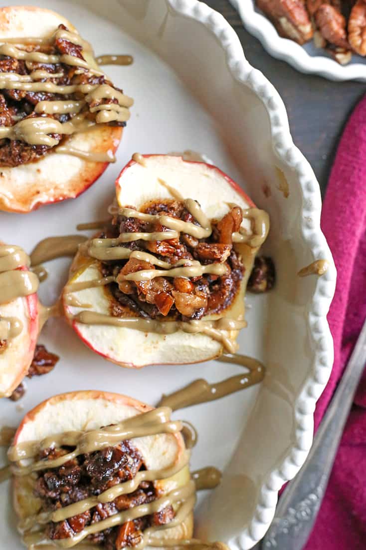 These Paleo Baked Apples with Crumble are easy to make and so delicious! Tender apples with a crunchy, sweet topping. They're gluten free, dairy free, vegan and naturally sweetened.