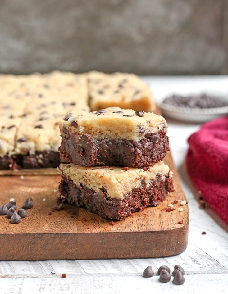 These Paleo Cookie Dough Topped Brownies are a decadent treat. Rich, fudgy brownies topped with an egg-free cookie dough. They are gluten free, dairy free, naturally sweetened and taste incredible!