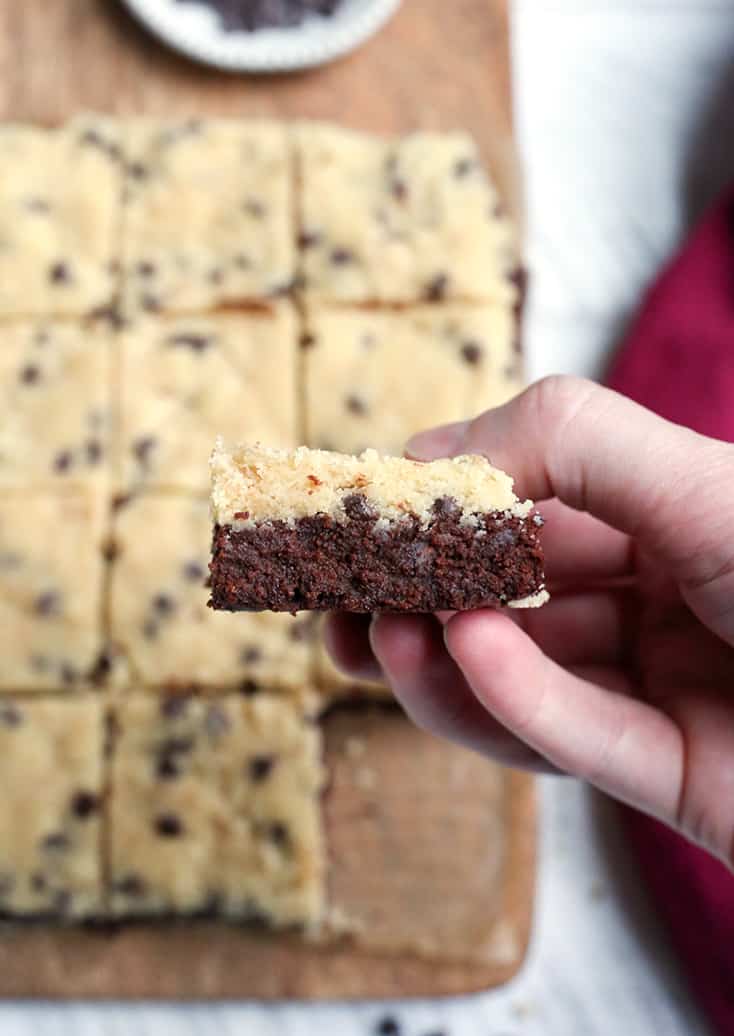 These Paleo Cookie Dough Topped Brownies are a decadent treat. Rich, fudgy brownies topped with an egg-free cookie dough. They are gluten free, dairy free, naturally sweetened and taste incredible!