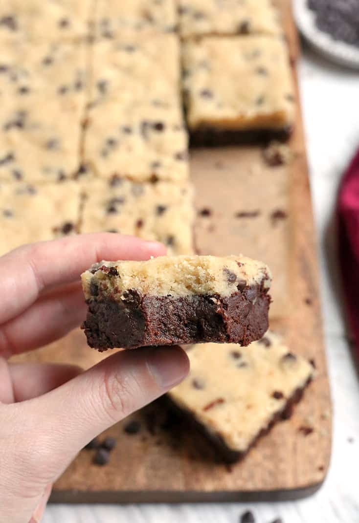 These Paleo Cookie Dough Topped Brownies are a decadent treat. Rich, fudgy brownies topped with an egg-free cookie dough. They are gluten free, dairy free, naturally sweetened and taste incredible!