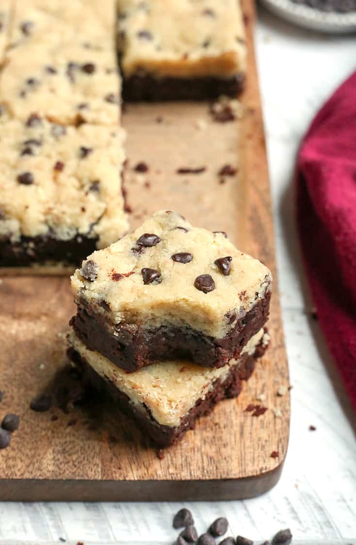 These Paleo Cookie Dough Topped Brownies are a decadent treat. Rich, fudgy brownies topped with an egg-free cookie dough. They are gluten free, dairy free, naturally sweetened and taste incredible!