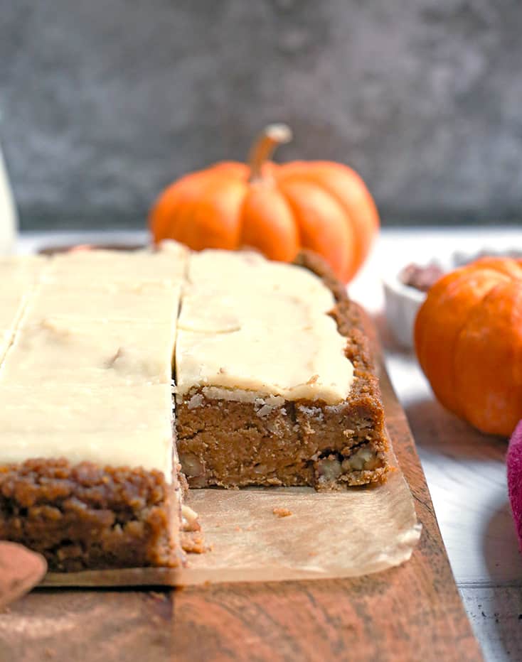 These Paleo Vegan Frosted Pumpkin Bars are simple to make and so delicious! Gluten free, dairy free, egg free, and naturally sweetened.