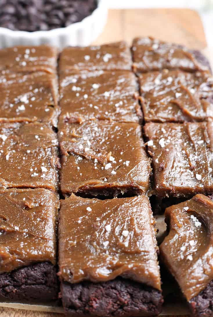 These Paleo Salted Caramel Brownies are a rich treat that everyone will love! A simple, fudgy brownie topped with a thick layer of dairy free caramel. They are nut free, gluten free, dairy free, and naturally sweetened.