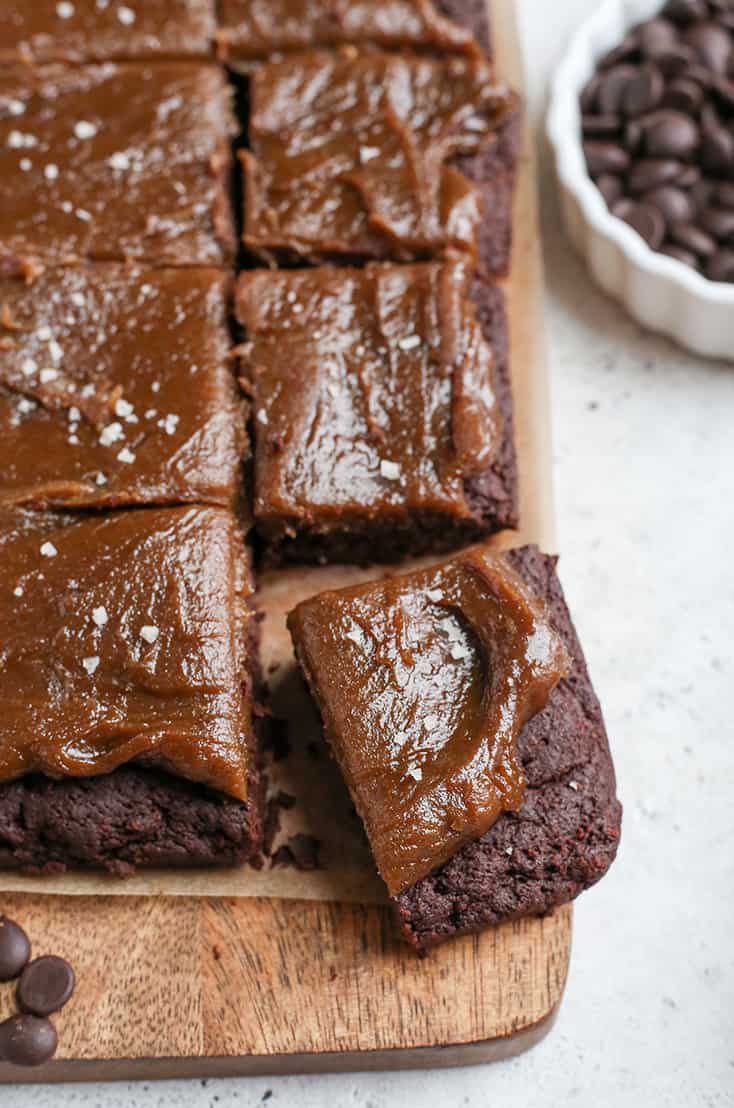 These Paleo Salted Caramel Brownies are a rich treat that everyone will love! A simple, fudgy brownie topped with a thick layer of dairy free caramel. They are nut free, gluten free, dairy free, and naturally sweetened.