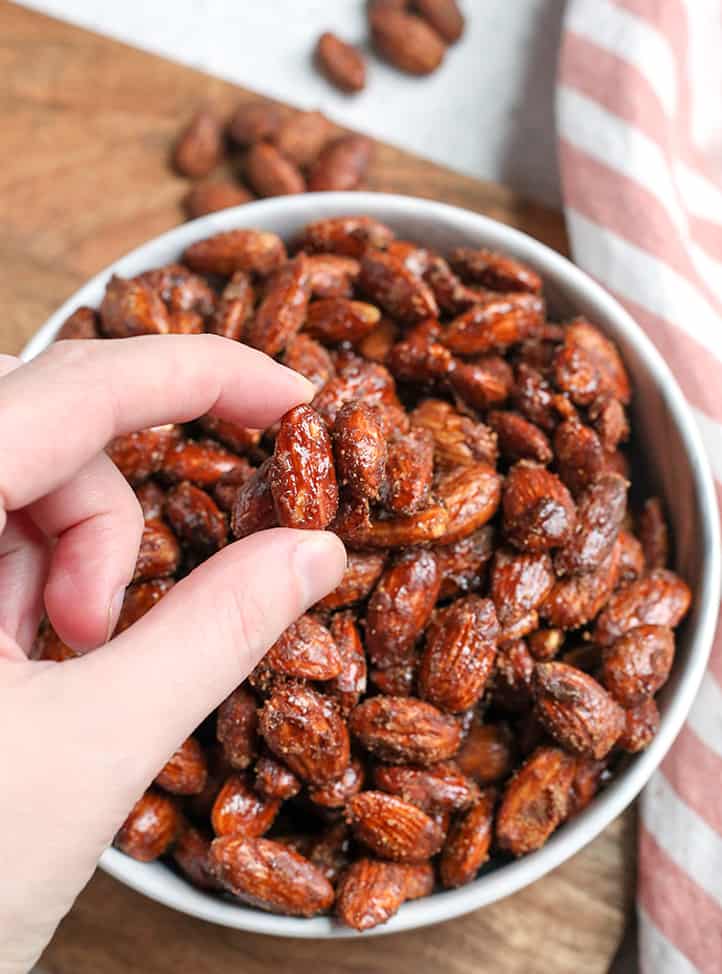 These Paleo Vegan Cinnamon Candied Almonds are sweet, crunchy, and so delicious! A great snack or treat that is gluten free, dairy free, egg free and naturally sweetened.