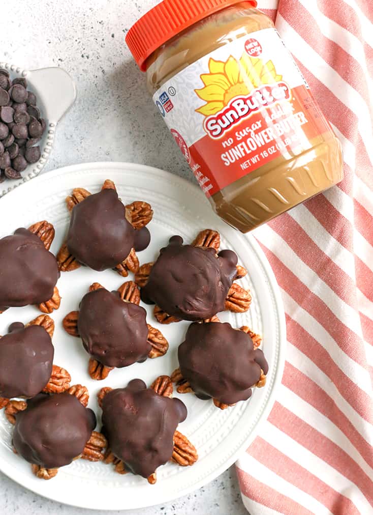 These Paleo Vegan Pecan Turtles are simple to make, no-bake, and so tasty. A healthy version of the classic candy. Sweet caramel on top of crunchy pecans and topped with chocolate. They are gluten free, dairy free, low FODMAP and naturally sweetened. 