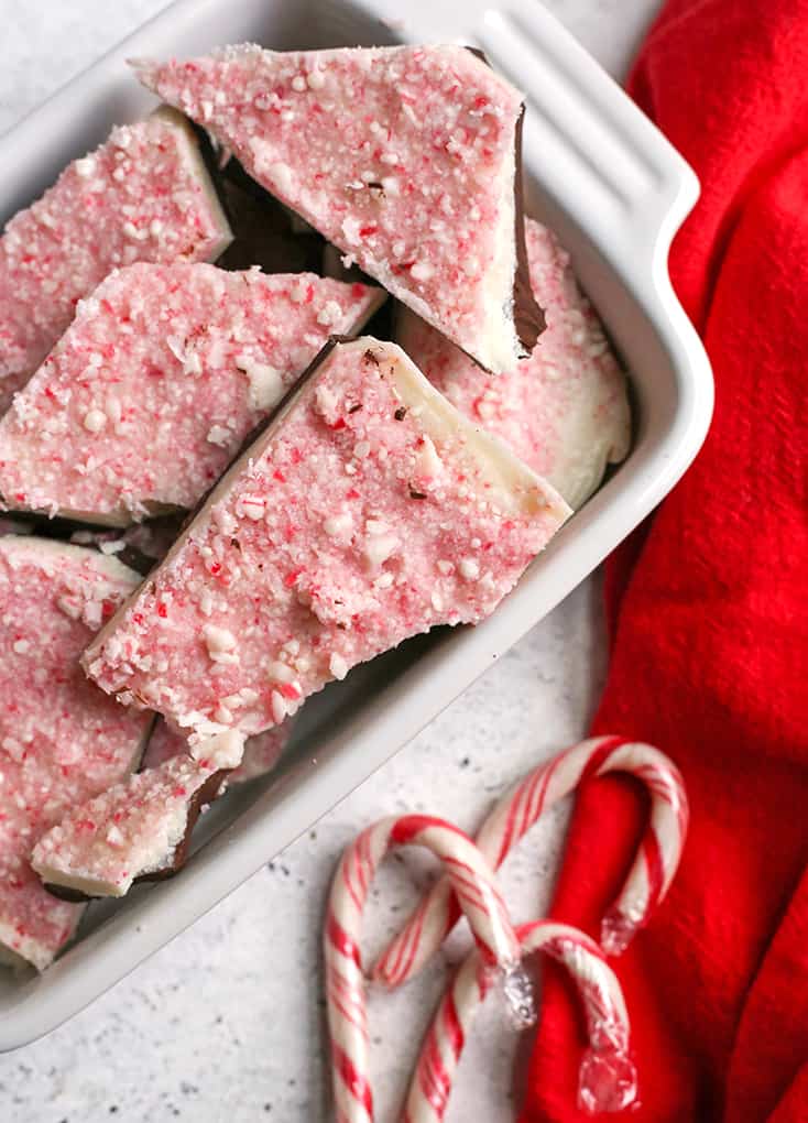 This Paleo Vegan Peppermint Bark is simple, quick, and such a delicious treat. It is no-bake, gluten free, dairy free, and naturally sweetened.