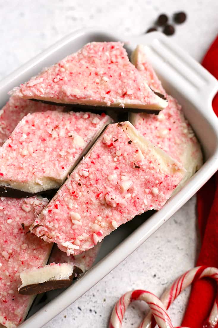This Paleo Vegan Peppermint Bark is simple, quick, and such a delicious treat. It is no-bake, gluten free, dairy free, and naturally sweetened.