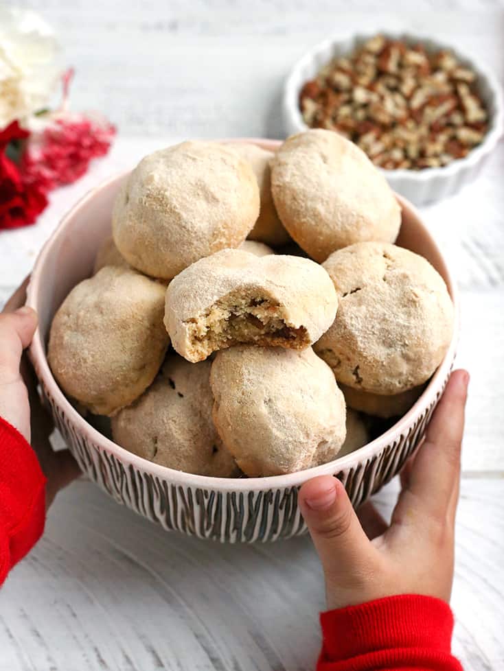 These Paleo Mexican Wedding Cookies also known as snow ball cookies or Russian Tea Cakes, are tender, sweet and so delicious! A crumbly cookie, packed with pecans, rolled in homemade powdered sugar. They are gluten free, dairy free, and naturally sweetened.