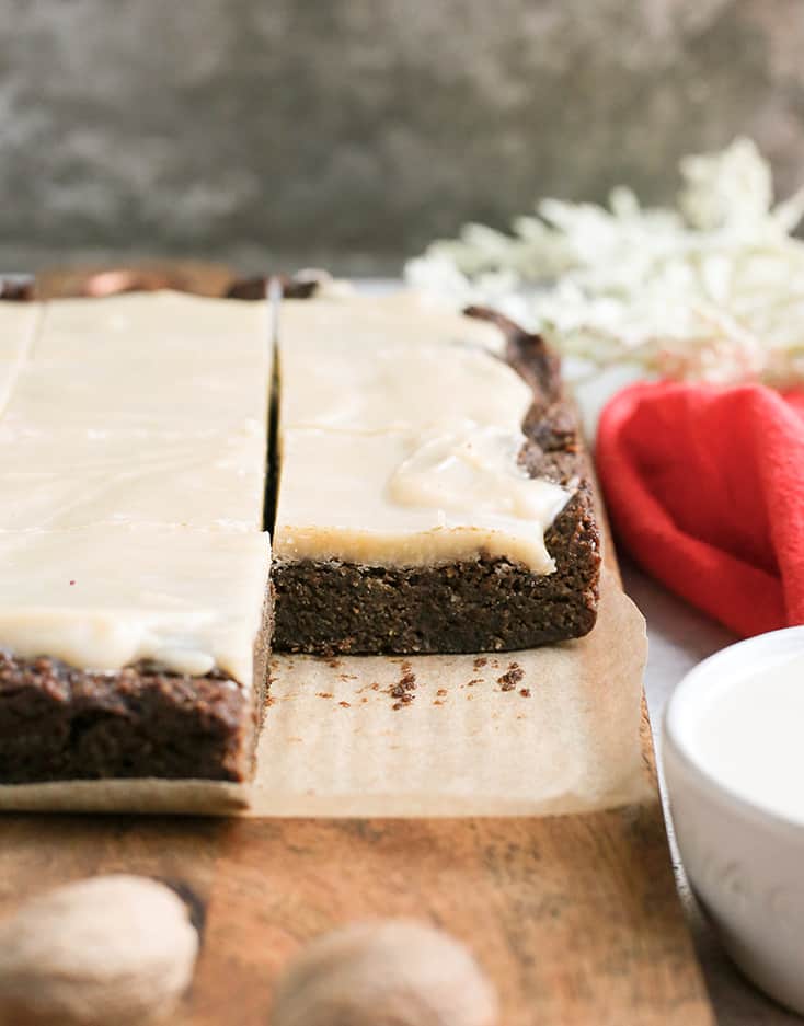 These Paleo Vegan Ginger Molasses Cookie Bars are simple to make and so flavorful. Rich, chewy and sweet while being nut free, gluten free, dairy free with an egg free and vegan option.