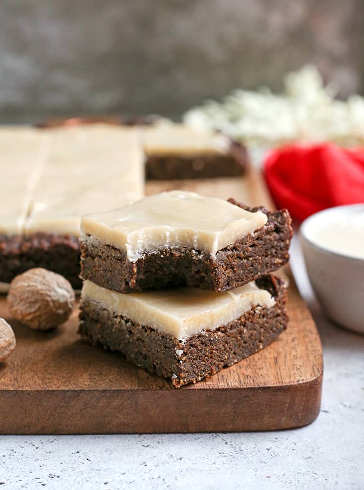These Paleo Vegan Ginger Molasses Cookie Bars are simple to make and so flavorful. Rich, chewy and sweet while being nut free, gluten free, dairy free with an egg free and vegan option.