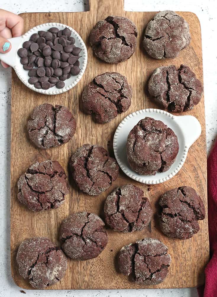 These Paleo Chocolate Crinkle Cookies are rich, thick and so delicious! Gluten free, dairy free, and naturally sweetened.