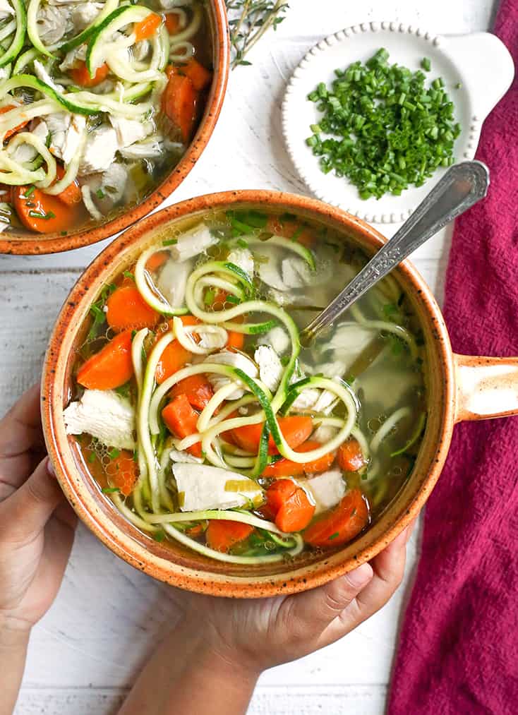 This Paleo Whole30 Chicken Zoodle Soup is just as good as the classic, made healthier. A satisfying soup that is gluten free, dairy free, low carb and low FODMAP. 