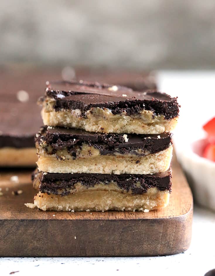 These Paleo Nut Free Tagalong Bars are simple to make and so delicious. A shortbread crust, sweet SunButter layer, and topped with chocolate. They are vegan, gluten free, dairy free, and naturally sweetened.