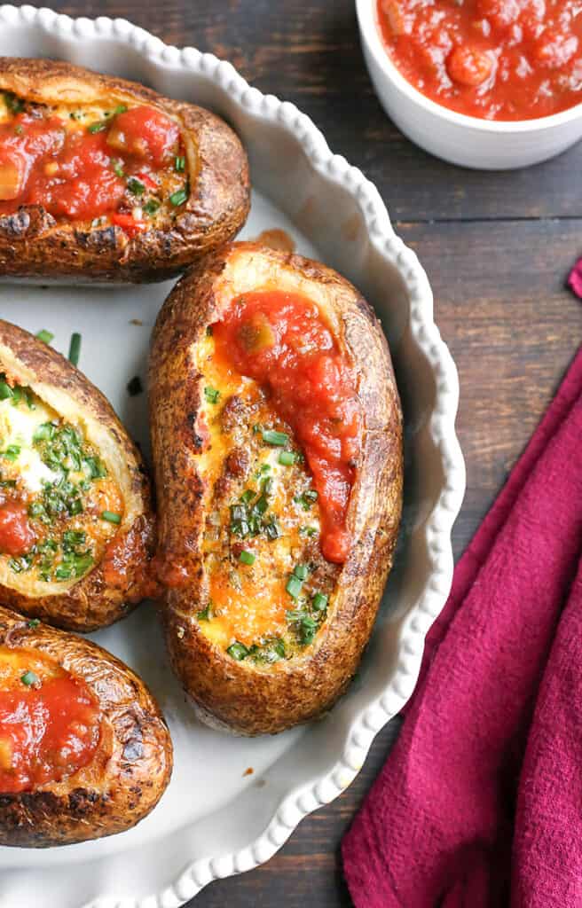 taco meat and eggs baked in a potato