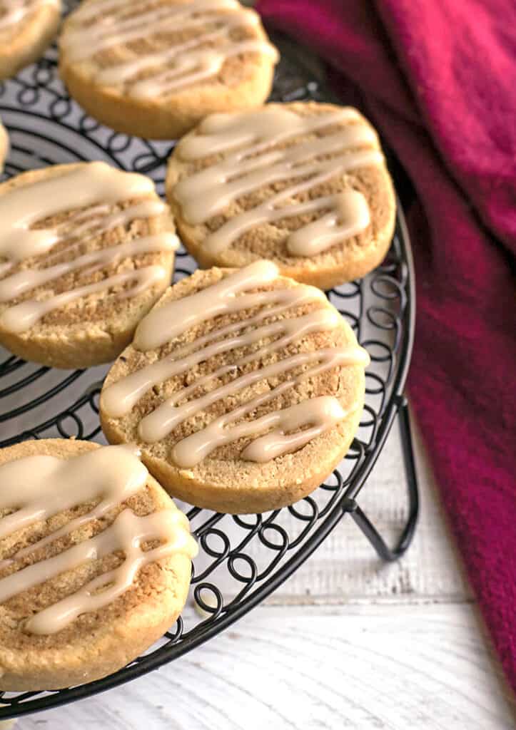 paleo cinnamon roll cookies on a cooling rack 