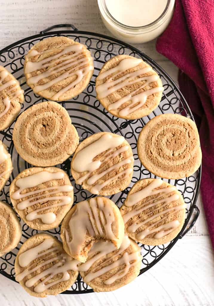 top shot of paleo cinnamon roll cookies. Some with glaze and some plain