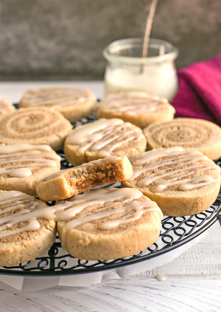 paleo cinnamon roll cookies on a cooling rack 