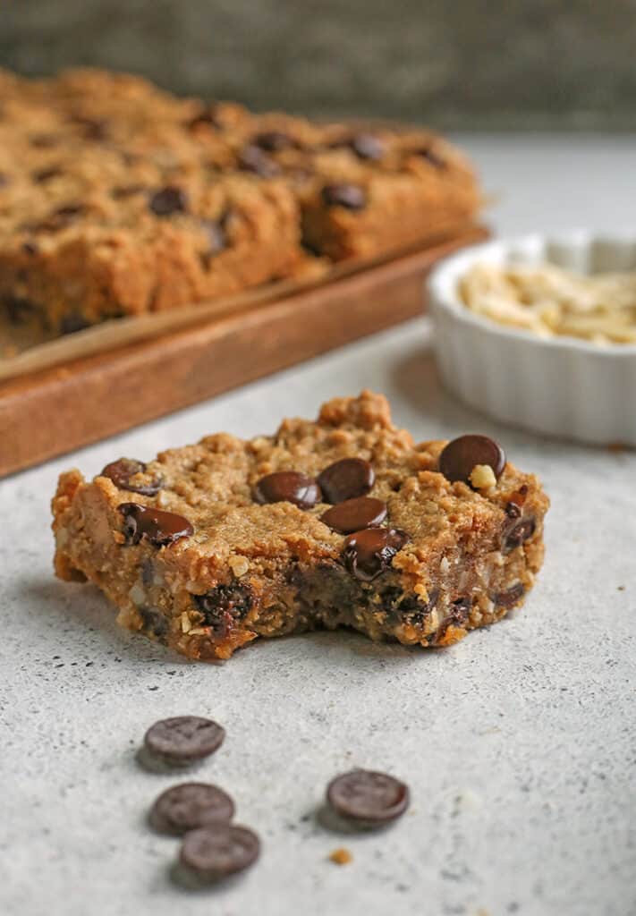 paleo oatmeal cookie bar, bite taken out of it