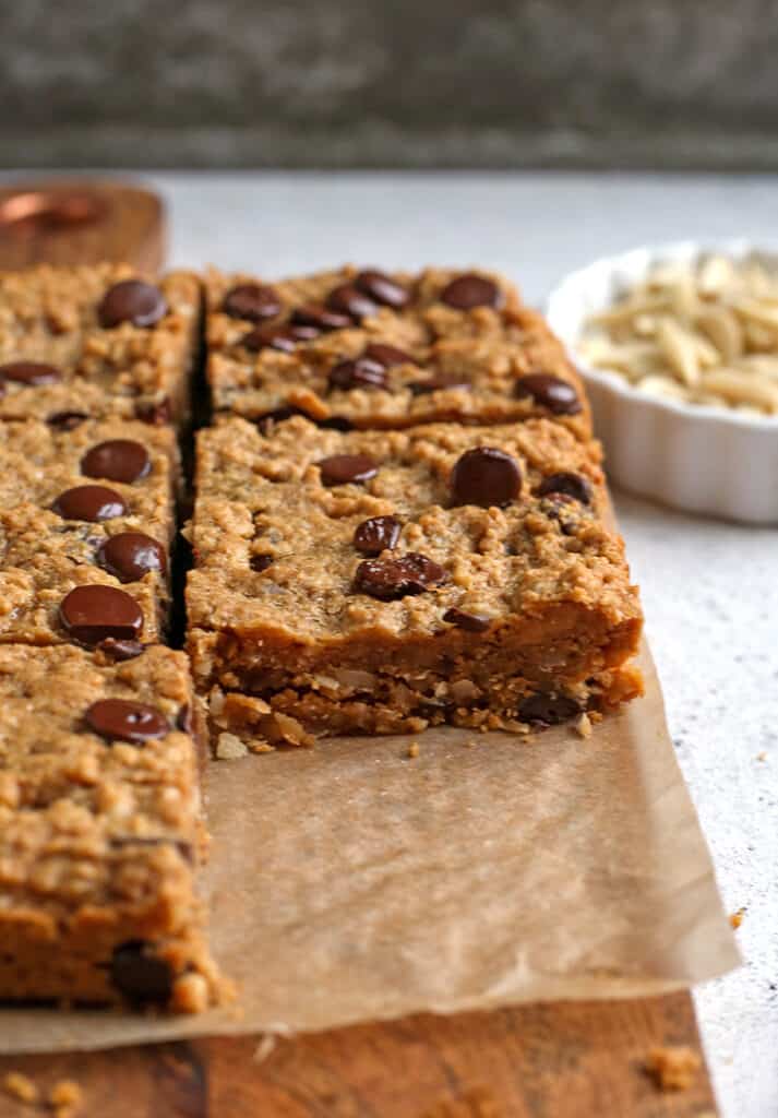 paleo oatmeal cookie bars, one removed to show the inside