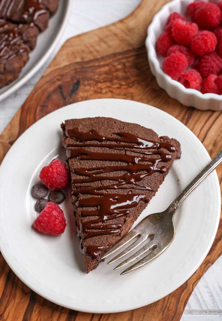 a paleo chocolate scones on a plate with a fork