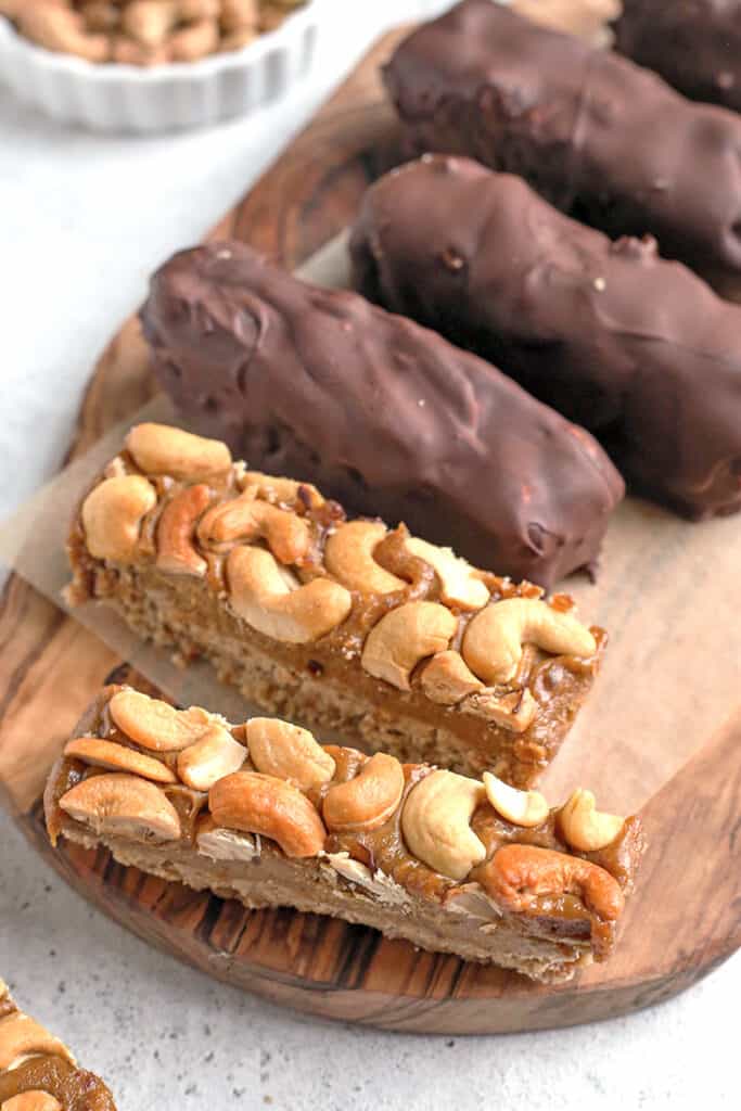 paleo vegan snickers bars. Close up shot and ingredients are visible. 