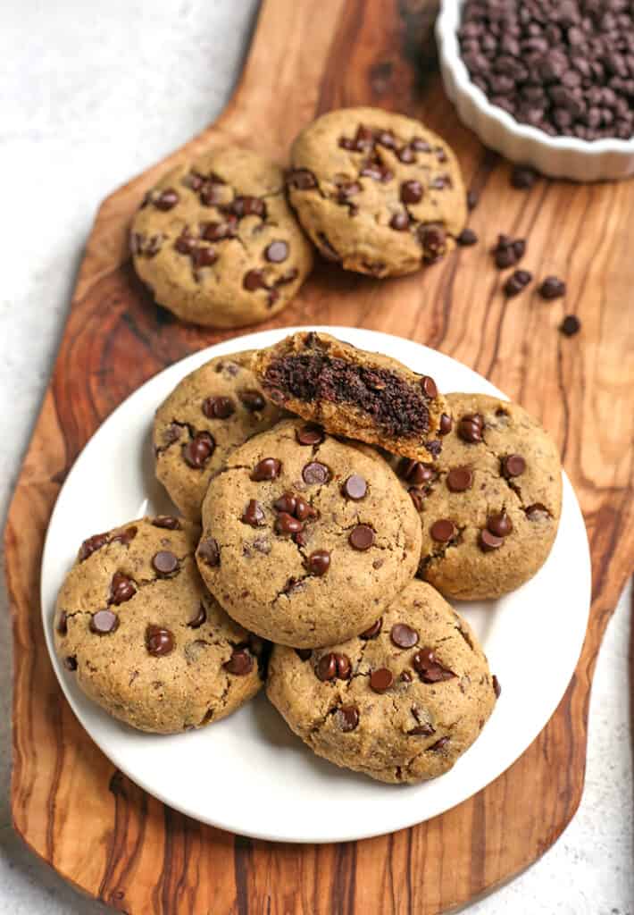 paleo vegan chocolate chip cookies with a brownie center on a plate