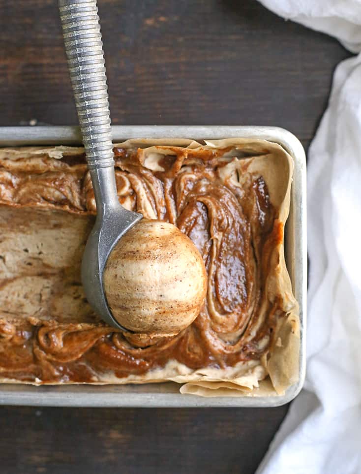 vegan paleo cinnamon roll ice cream, view from the top with a scoop being scooped