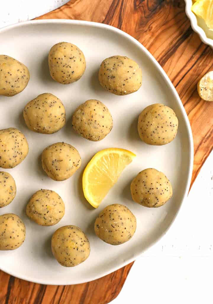 a plate of vegan paleo lemon poppy seed bites