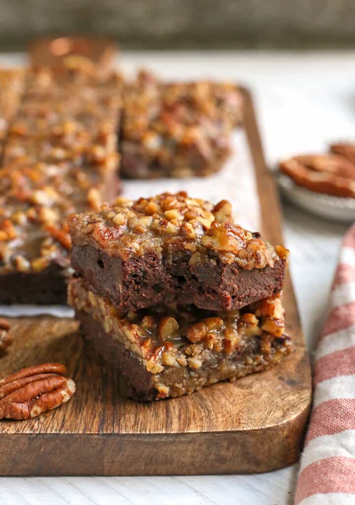 a stack of two paleo pecan praline brownies 