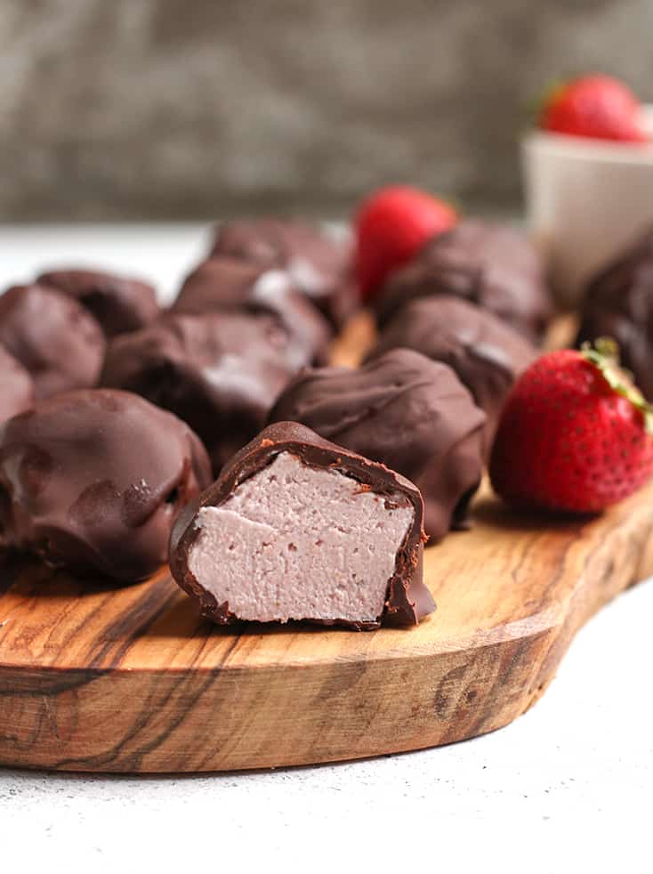 a platter of paleo strawberry cheesecake bites