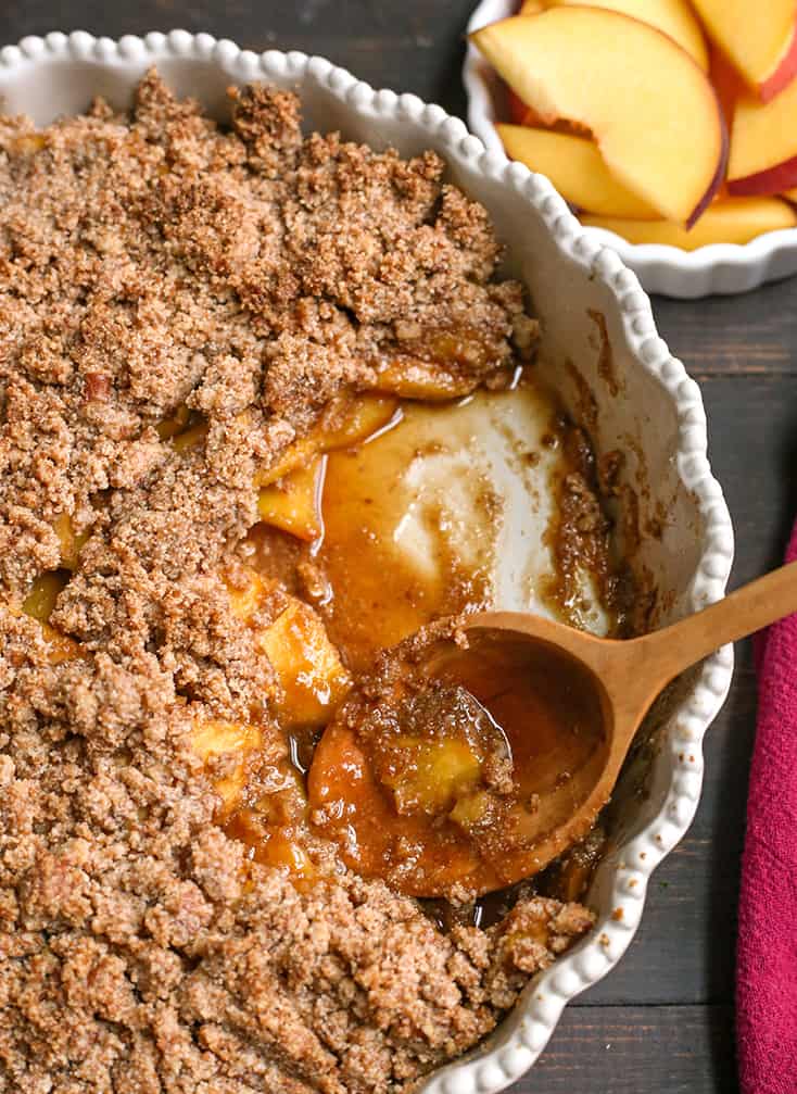 vegan paleo peach crisp in a pie plate