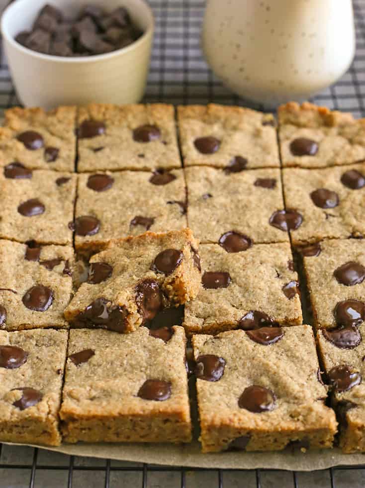 grain free brown butter blondies, cut with a bite out of one