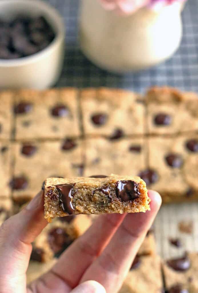 hand holding a brown butter blondie 