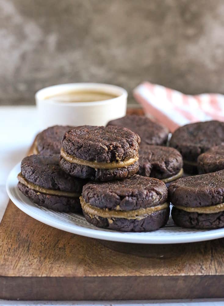 a plate of paleo chocolate sandwich cookies 