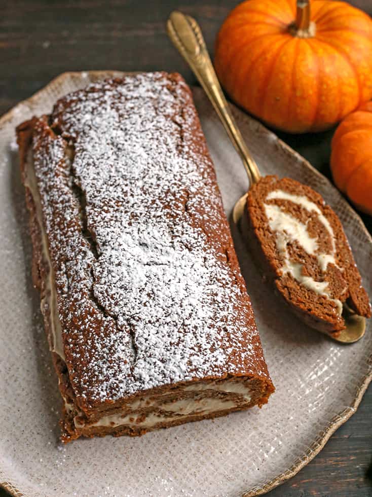 the whole paleo pumpkin roll with one slice cut out