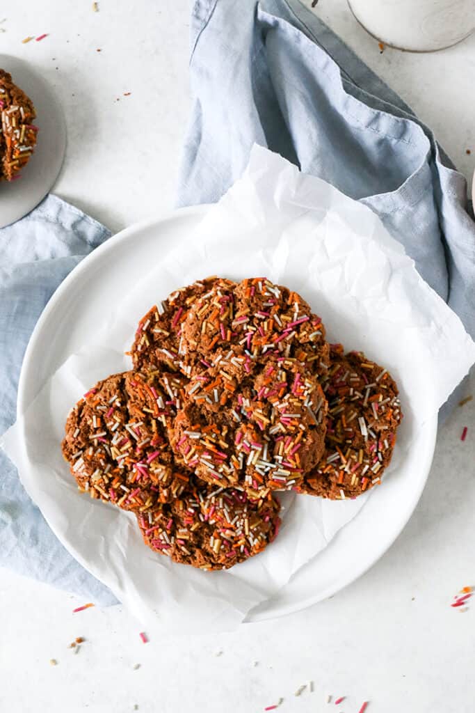 a stack of paleo sprinkle cookies on a little plate 