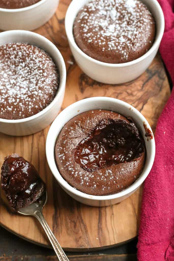 paleo chocolate hot fudge cups with a bite taken out 