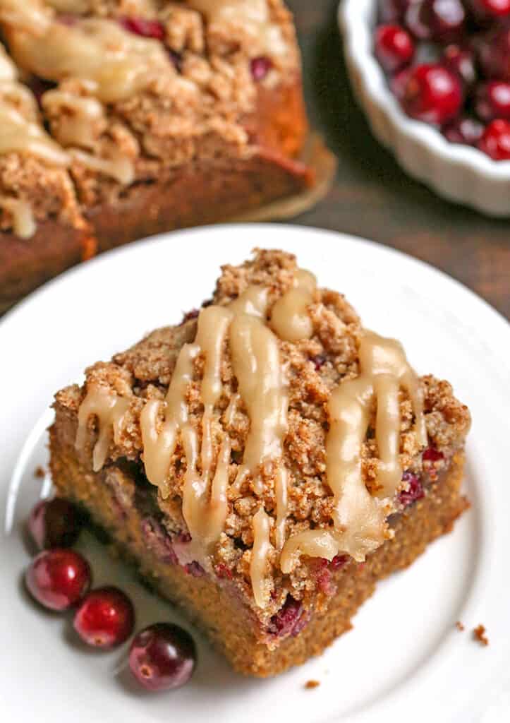slice of paleo cranberry coffee cake on a small plate