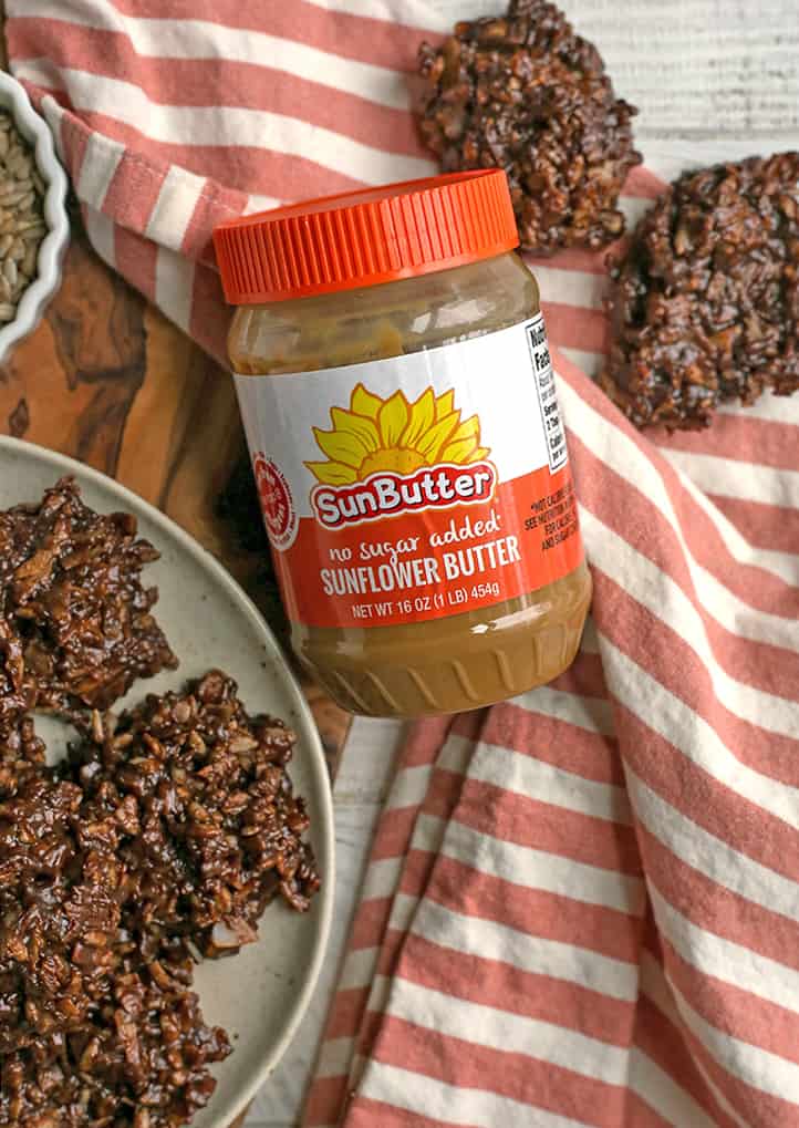 paleo nut free no bakes with a jar of sunbutter