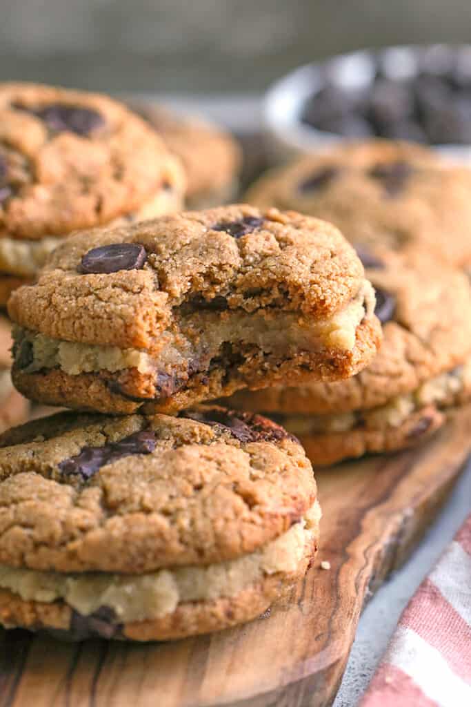 bite taken out of paleo chocolate chip cookie dough sandwich 