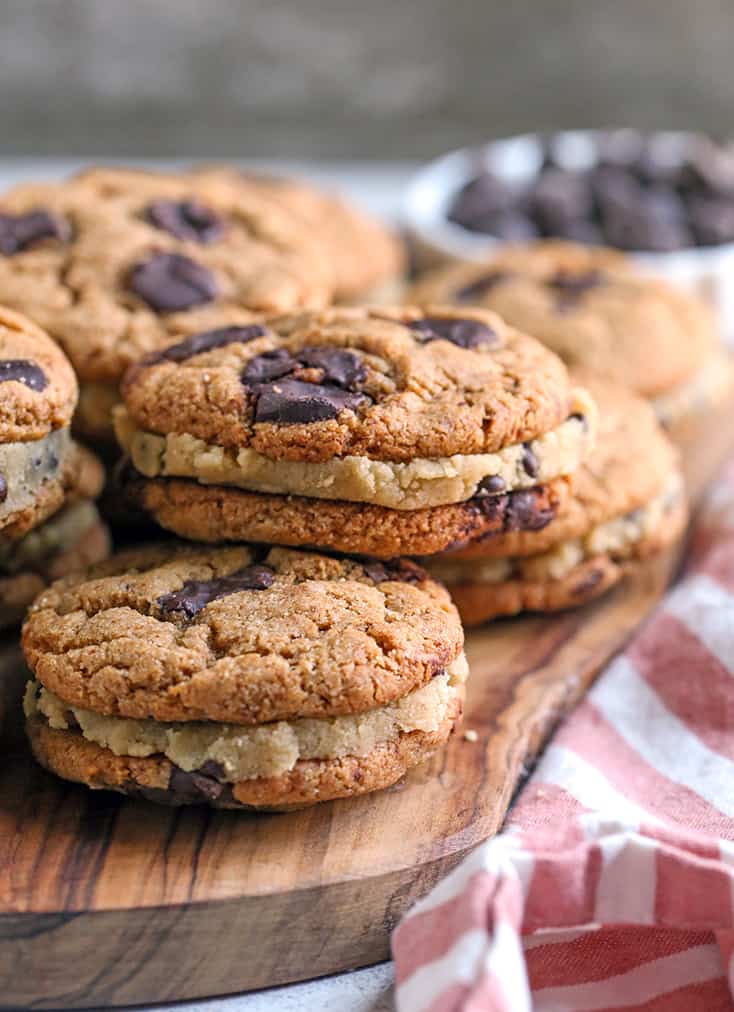 vegan paleo chocolate chip cookie dough sandwiches on a cutting board