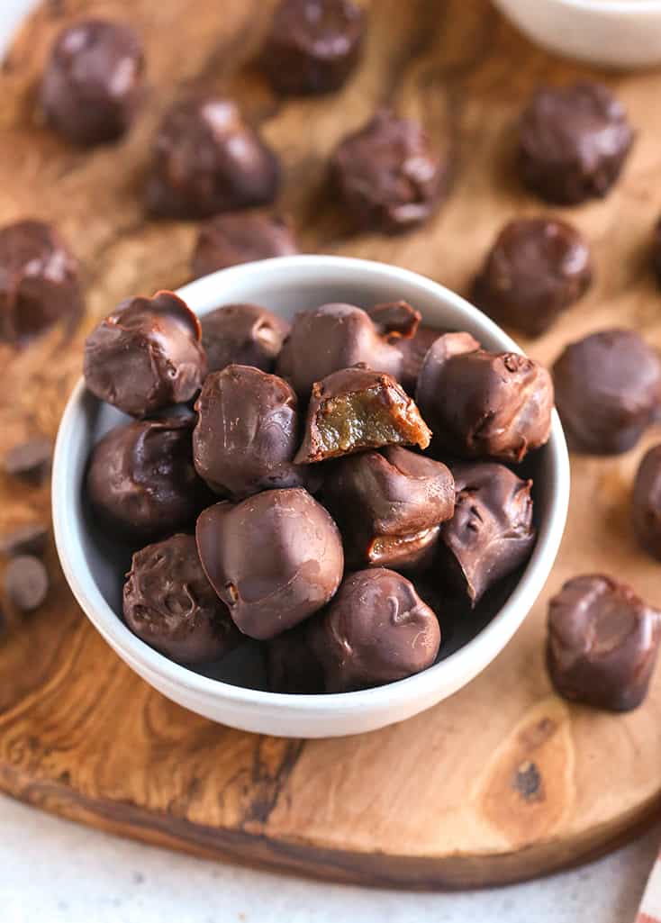 close up of a small bowl of paleo vegan rolos 