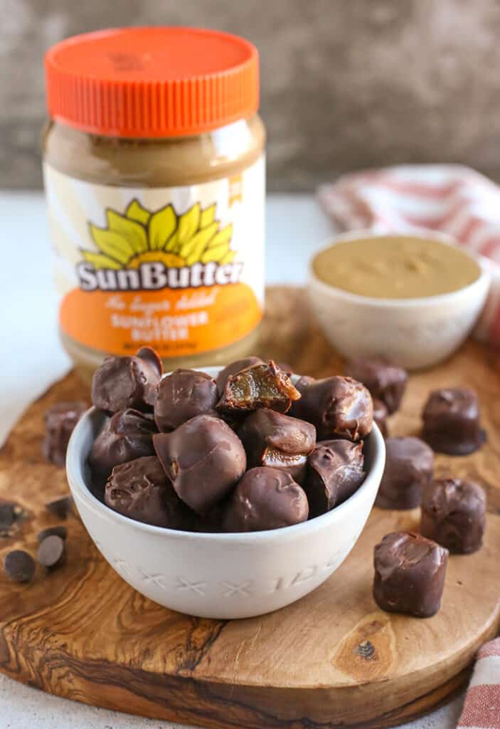 paleo vegan rolos in a small bowl on a cutting board 